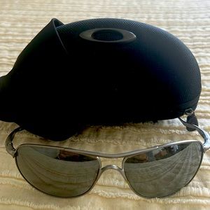 Never worn Oakley Crosshair sunglasses. Includes hard case, and cloth.